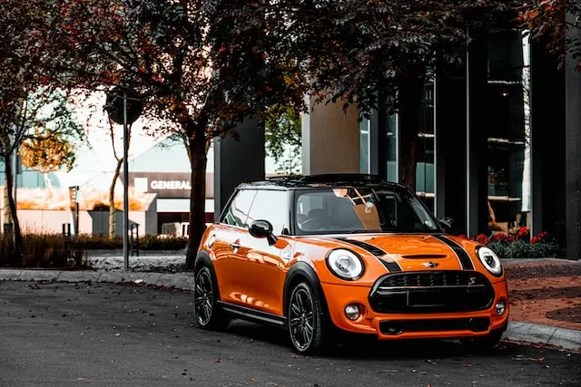 Orange-Mini-Cooper-car-parked-on-the-street