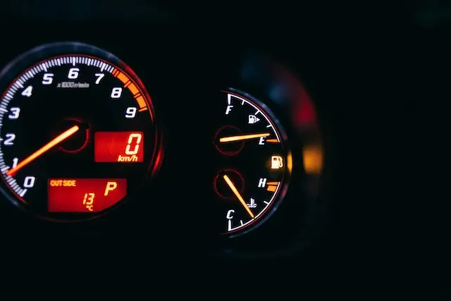 A fuel and temperature gauge and a tachometer