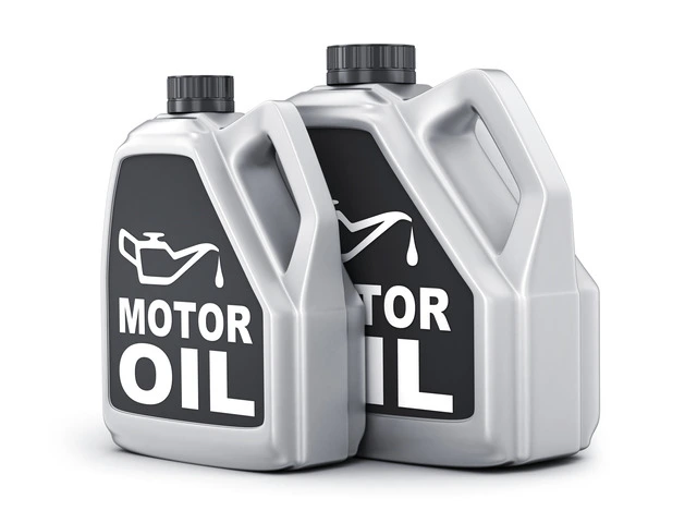 Two-can-motor-oil-on-white-background