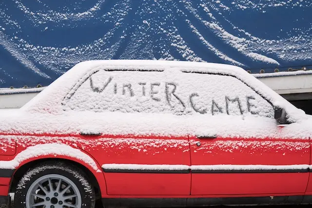 A-red-car-covered-with-snow