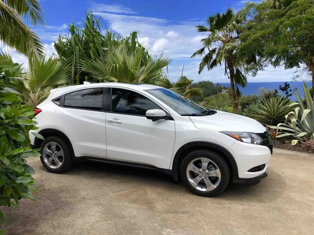 Honda HR-V car surrounded by foliage