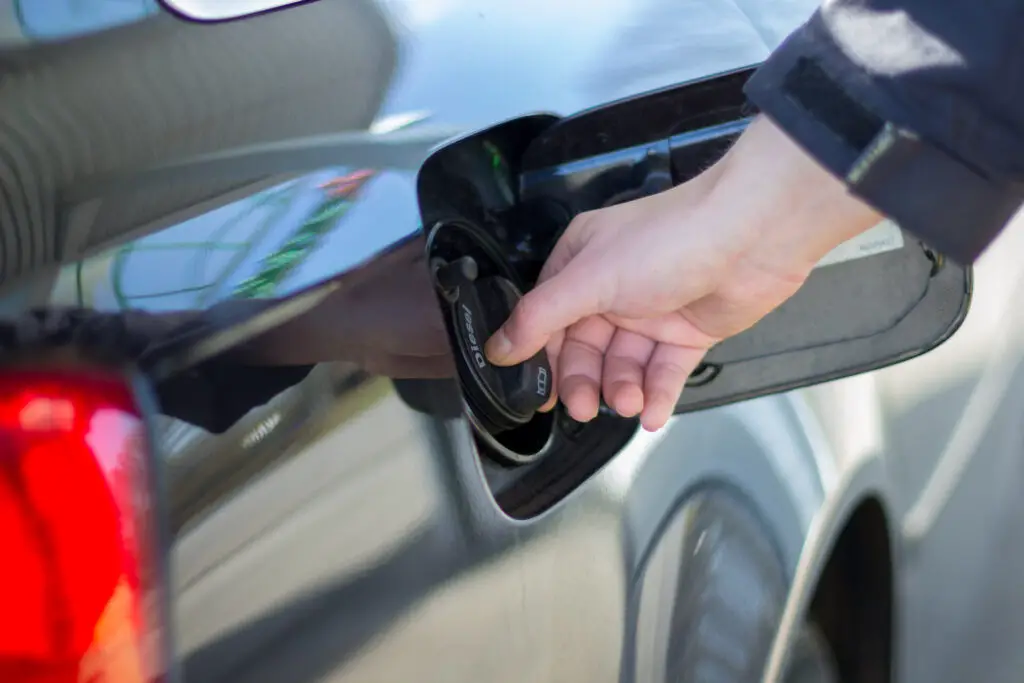 Man opening a gas cap