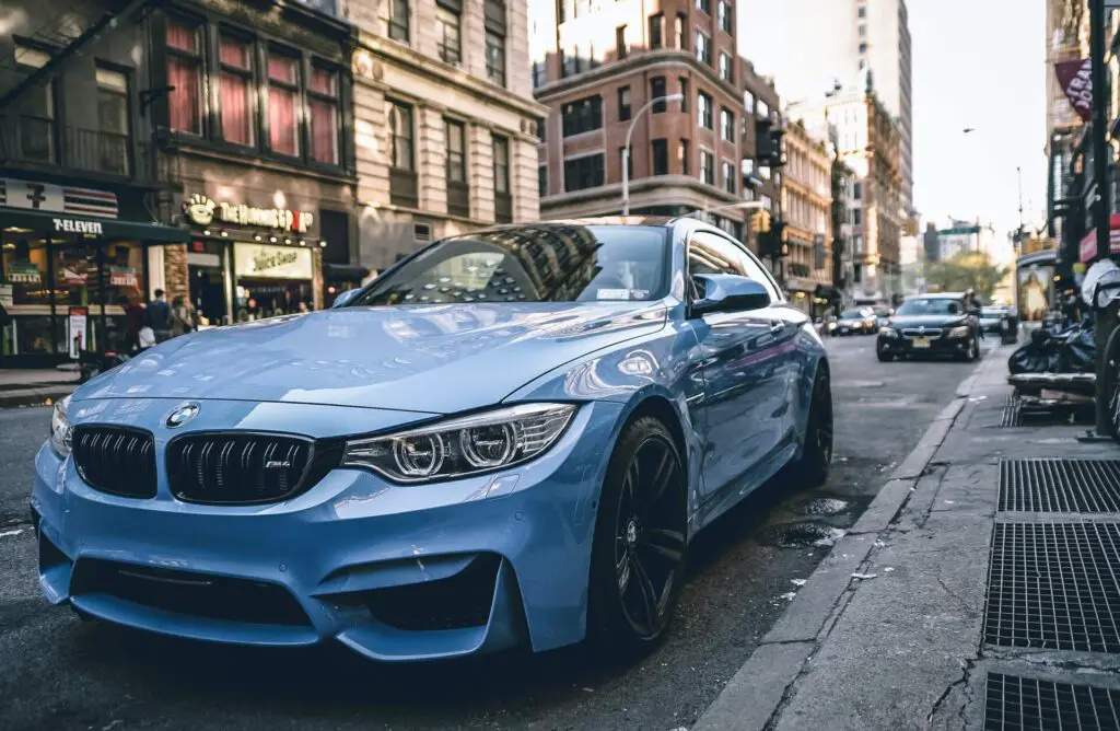 A blue BMW coupe car