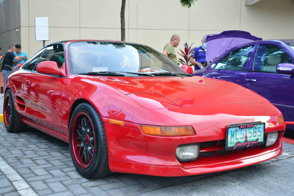 A red Toyota MR2 SW20 car