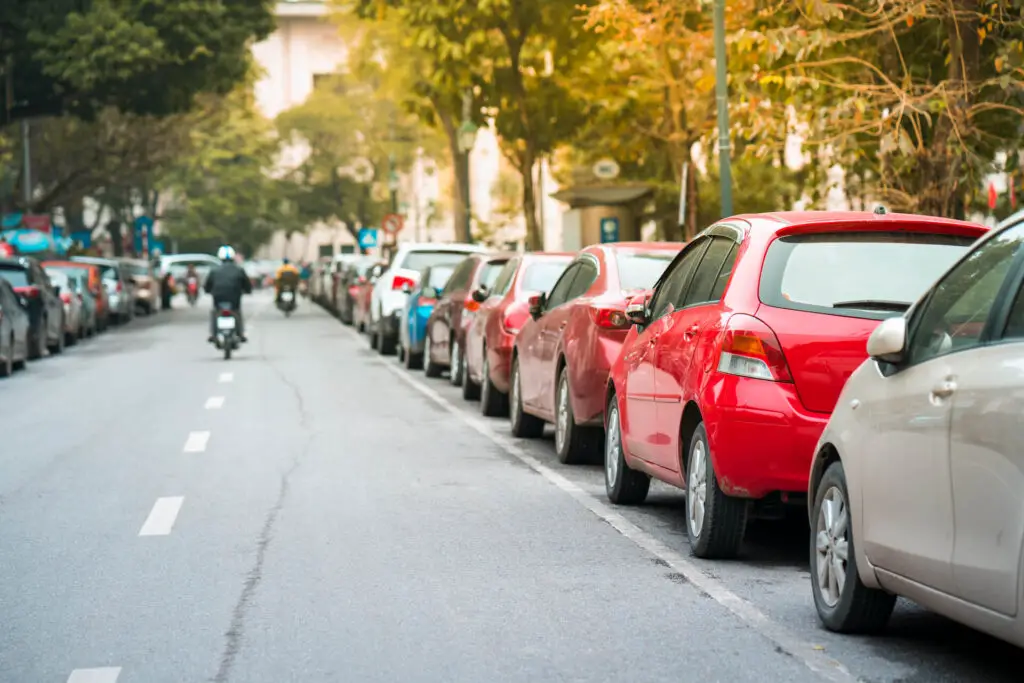 A street filled with parked cars