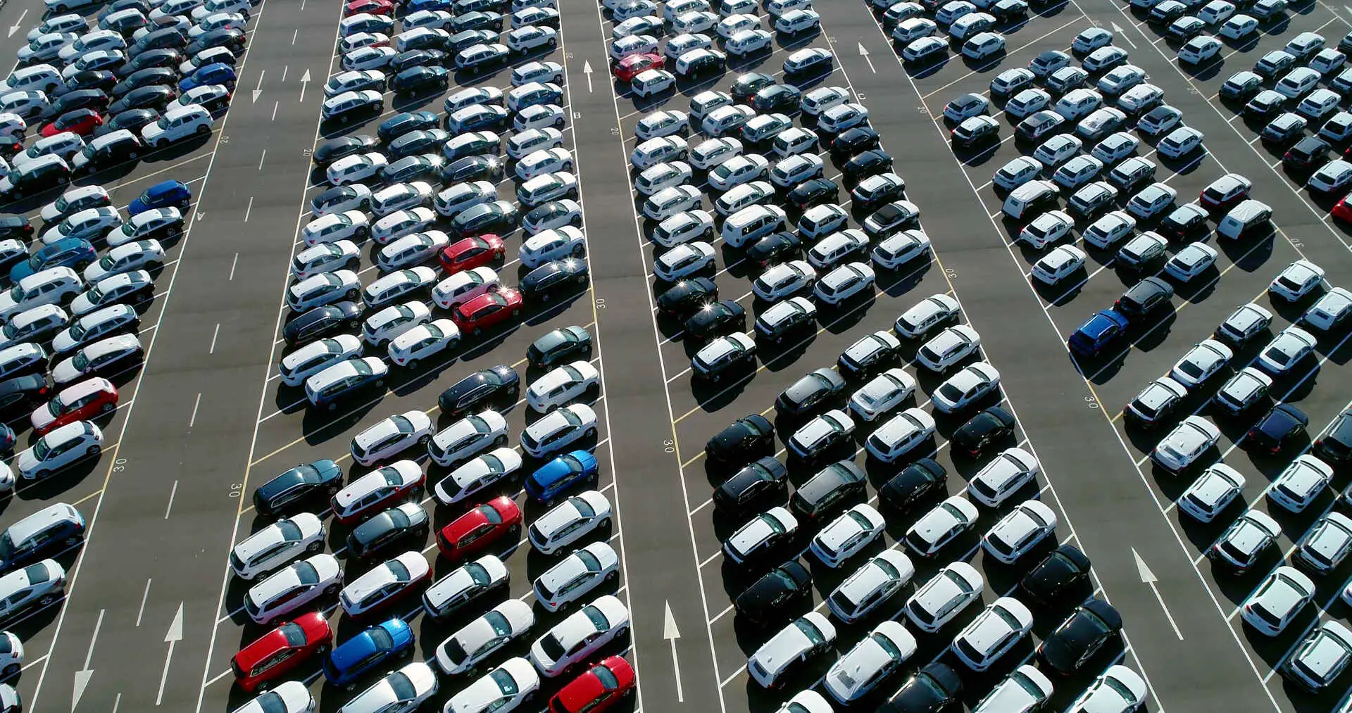 Cars parked in angled parking spaces