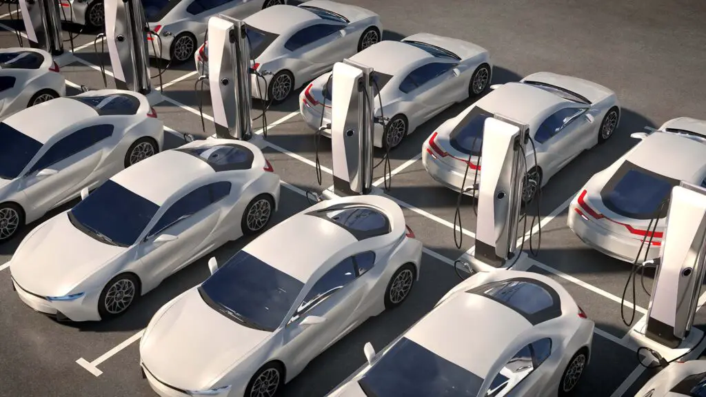 Parked electric cars at charging stations