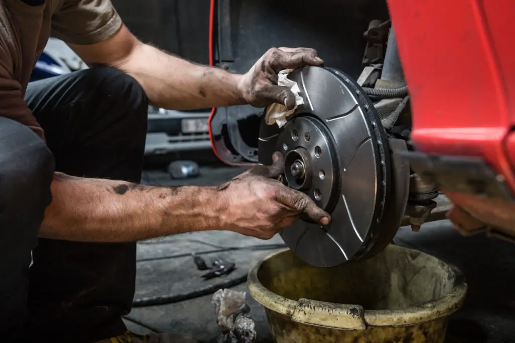 Mechanic fixing a car