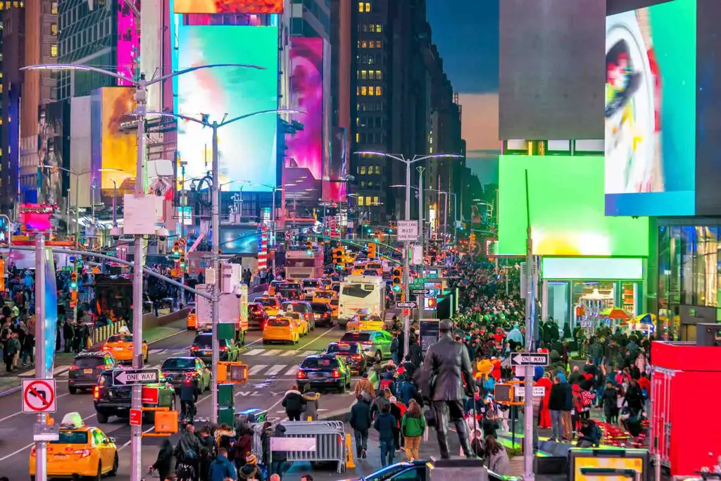 Times Square area with neon art and commerce, an iconic street of Manhattan in New York City , United States