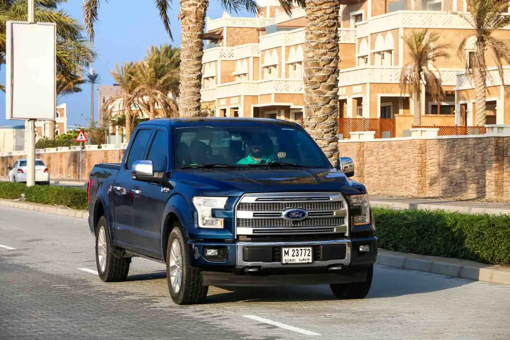 Dubai, UAE - November 18, 2018: Pickup truck Ford F-150 in the city street.