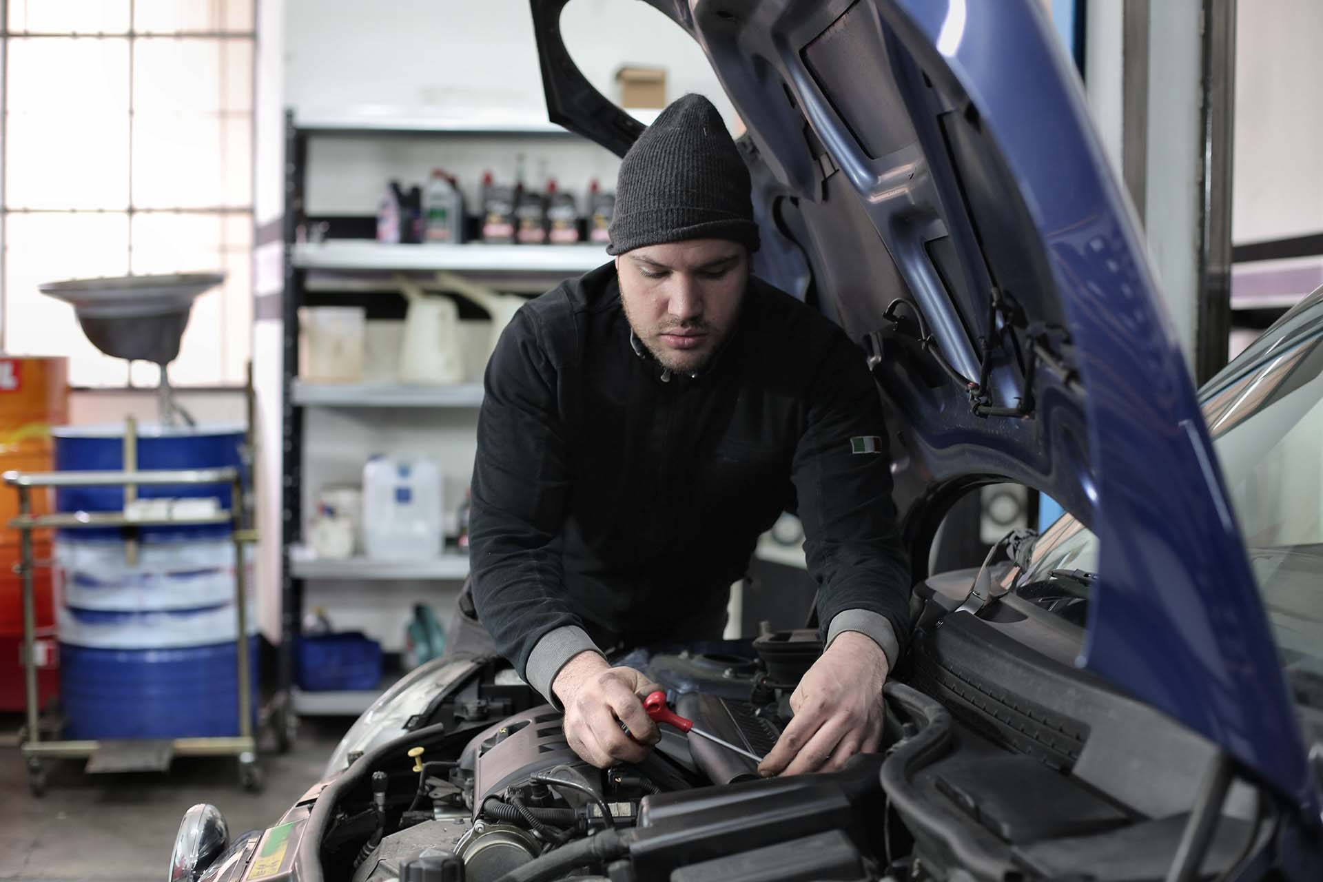 Man fixing a car