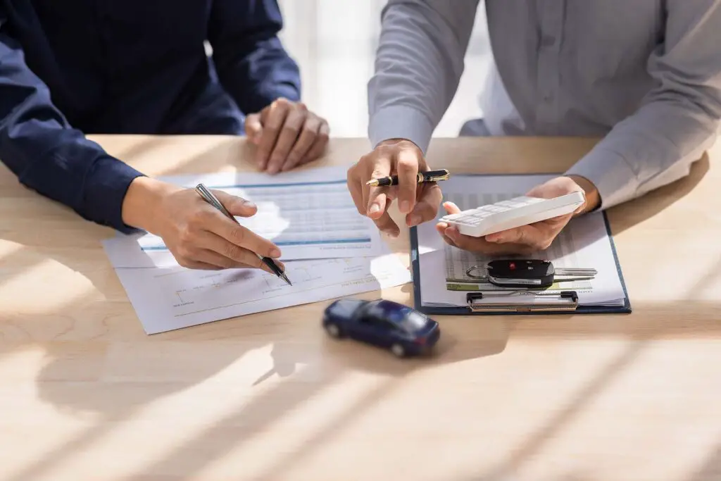 Person signing a lease contract