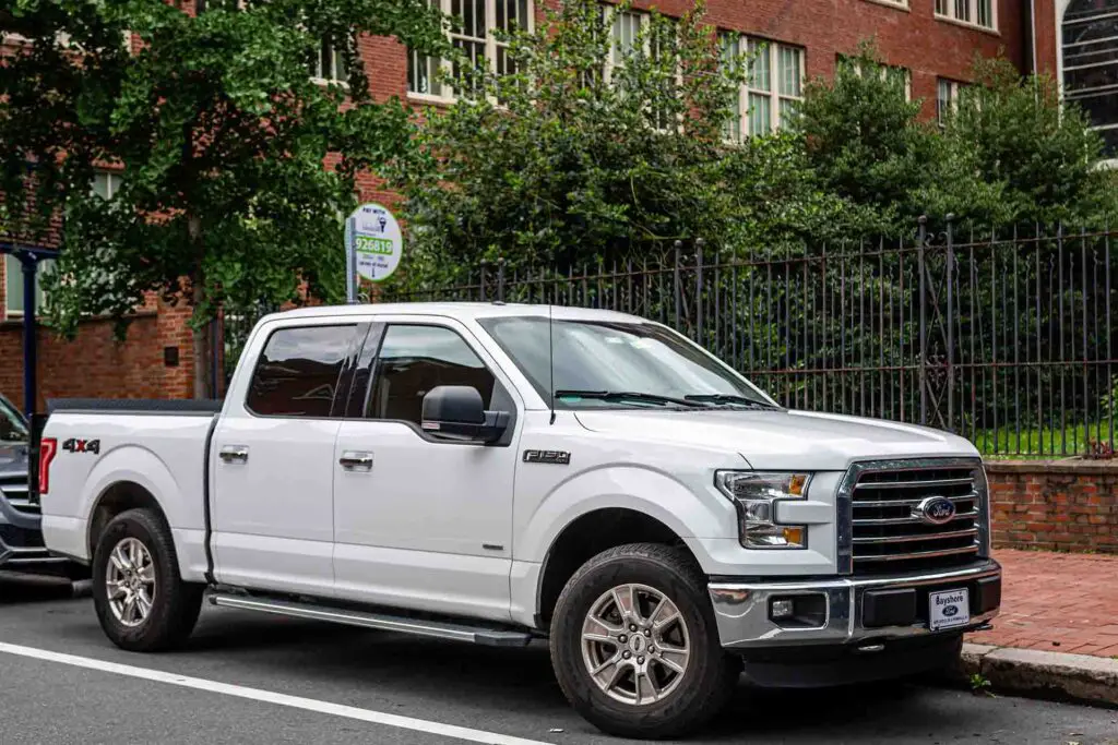 Philadelphia, Pennsylvania, USA - June 17, 2019: white Ford truck pickup parked on the side of the street, Philadelphia