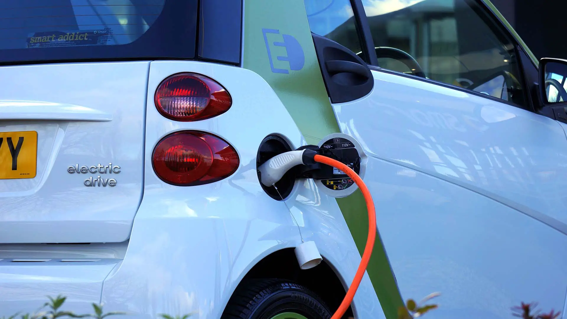 An electric vehicle is charging