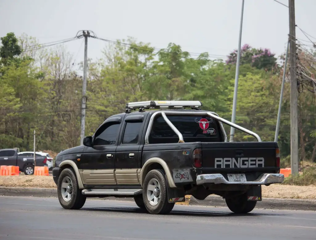 Private Pickup car, Ford Ranger. On road no.1001, 8 km from Chiangmai city.