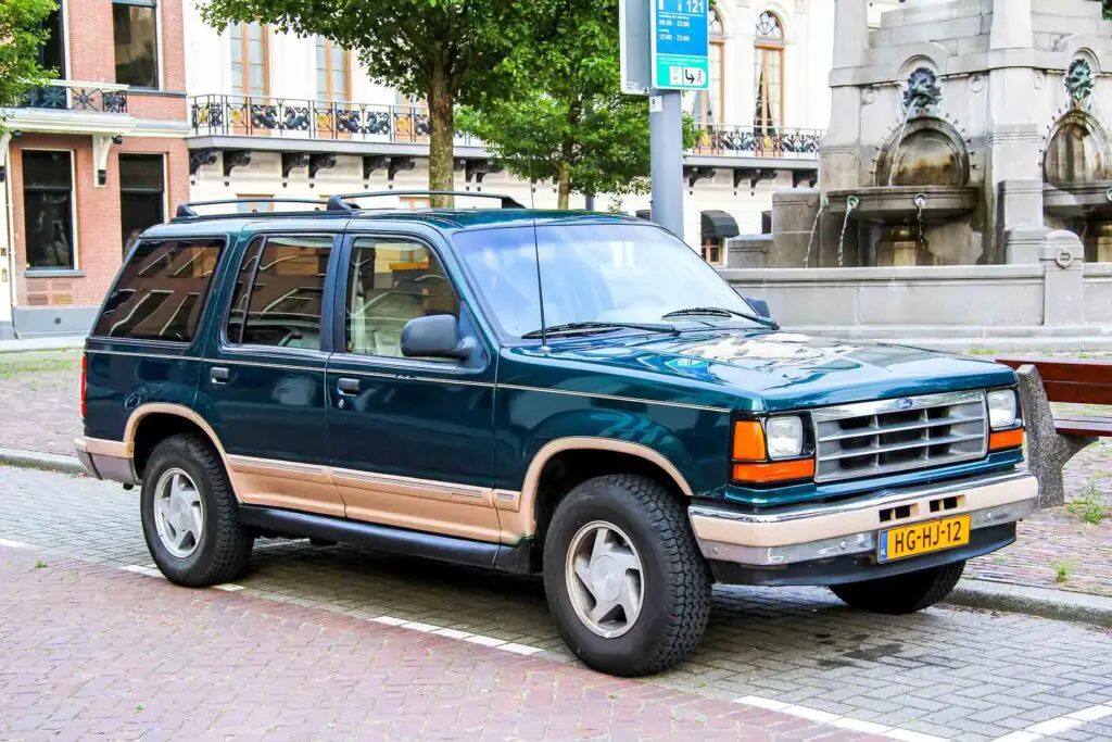 Motor car Ford Explorer in the city street.