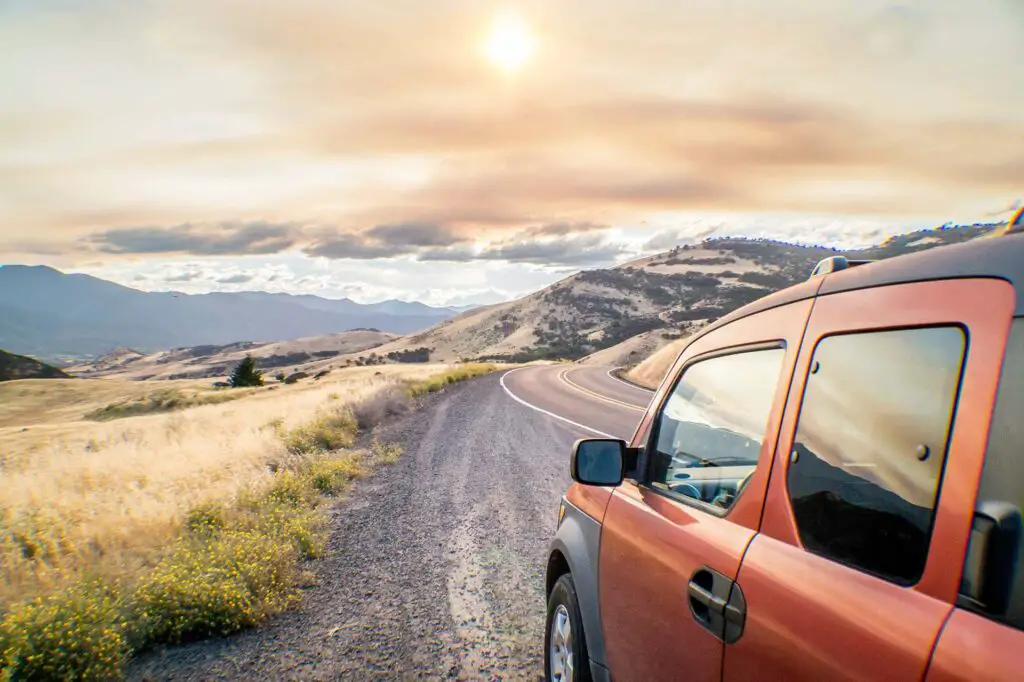 Honda Element car on the road overlooking a beautiful landscape