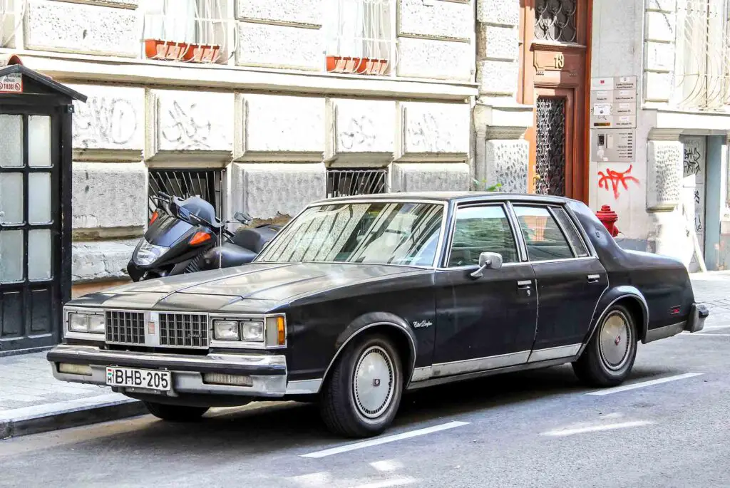 Motor car Oldsmobile Cutlass Supreme in the city street.