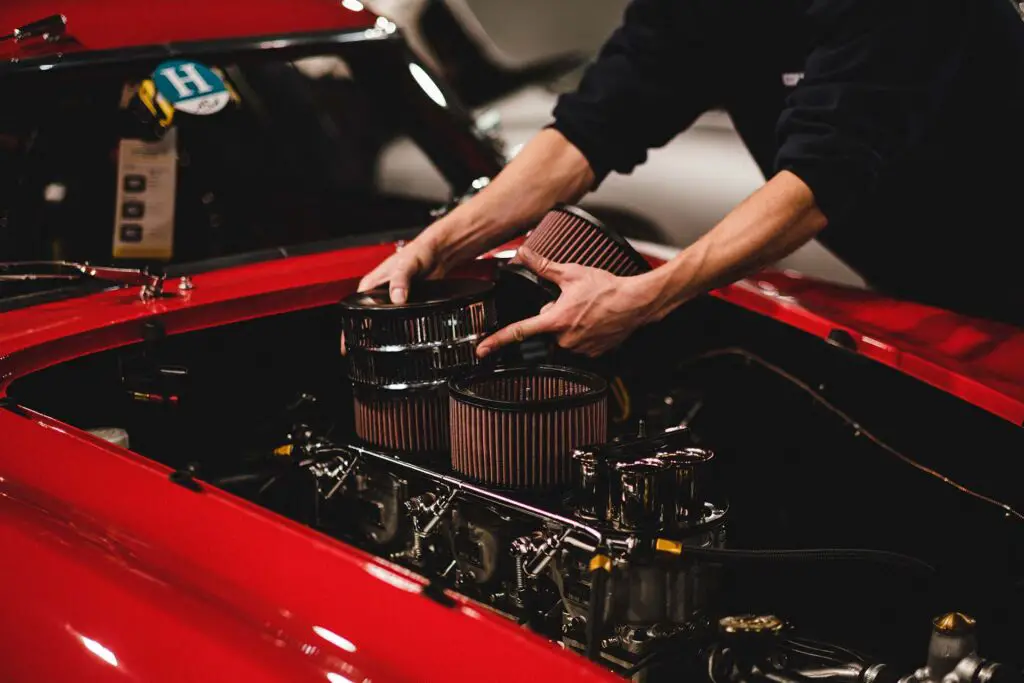 A mechanic adjusting cables and brakes