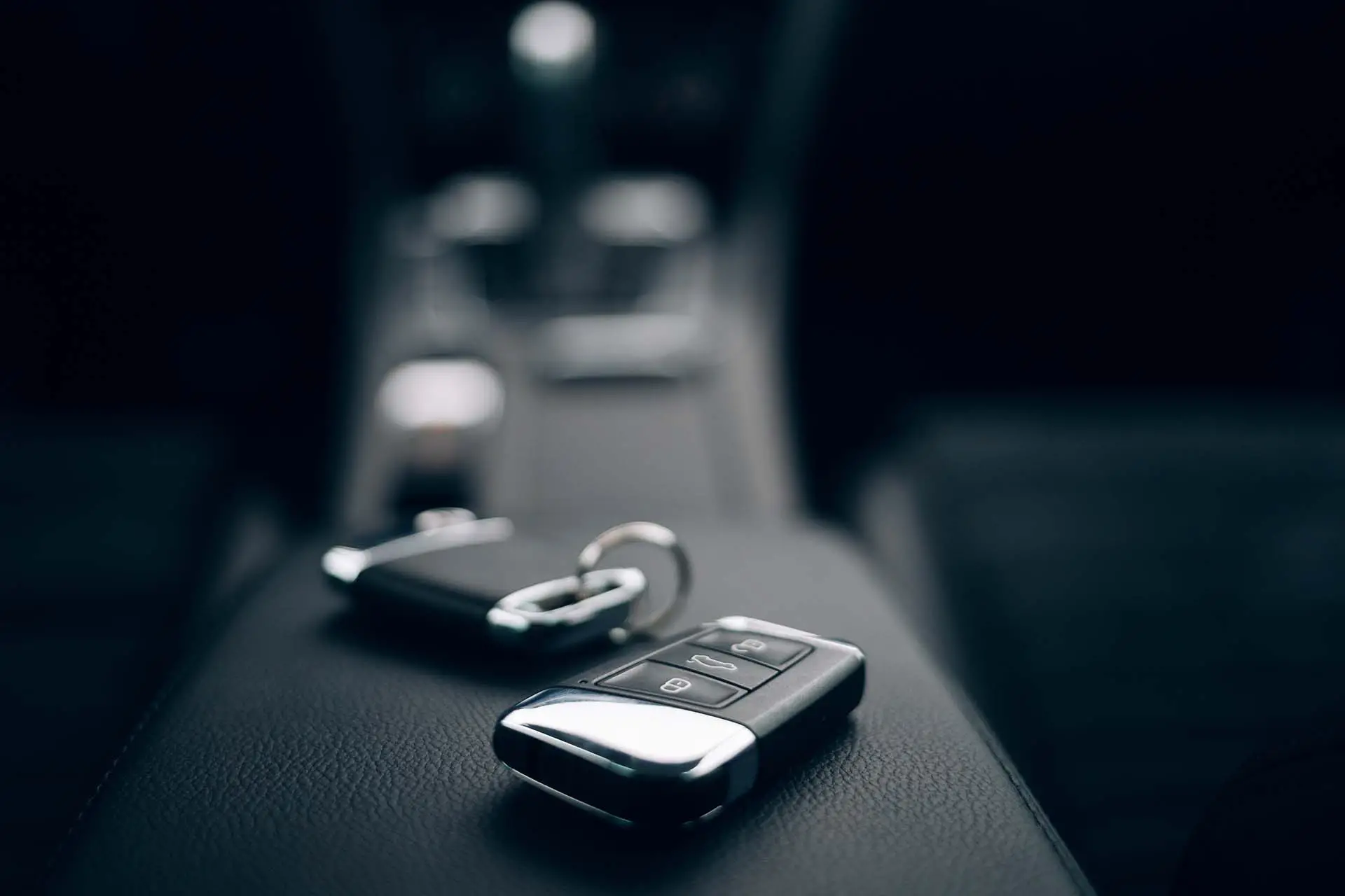 Car keys inside automobile. Rental service. Car ignition keys at