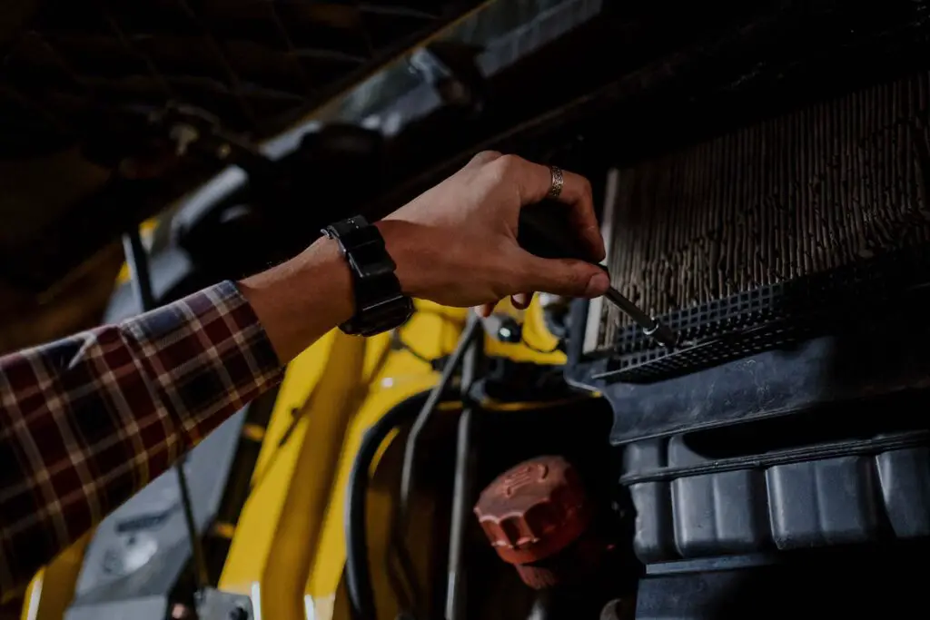 Person fixing the engine air filter 