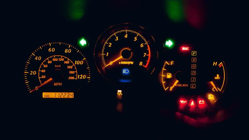 Toyota RAV4 instrument cluster, black and yellow analog speedometer