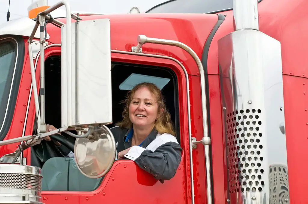 A woman driving a truck