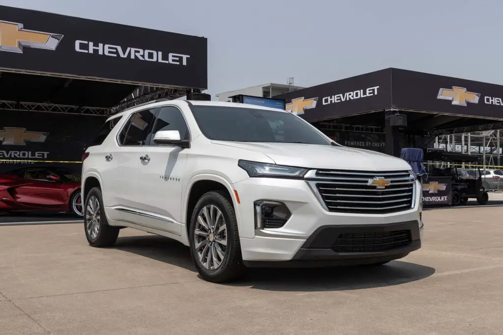 A white Chevrolet Traverse parked