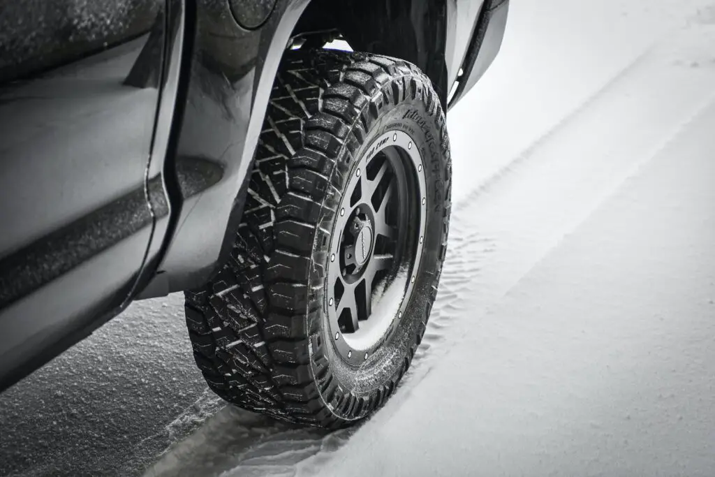 A car tire on a snow