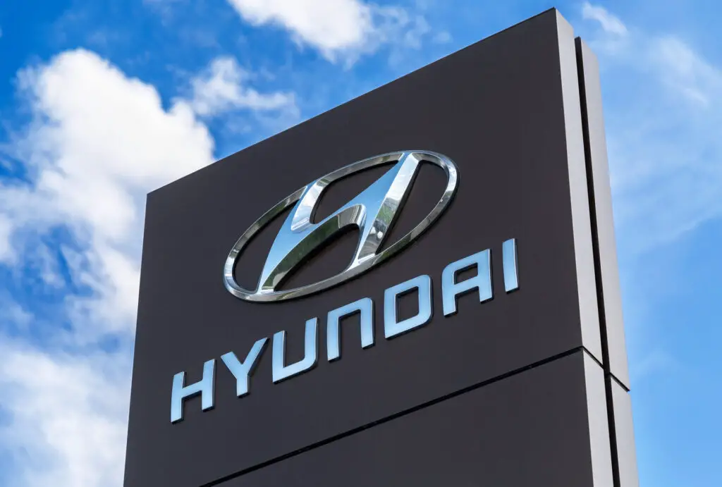 Hyundai dealership sign against the blue sky