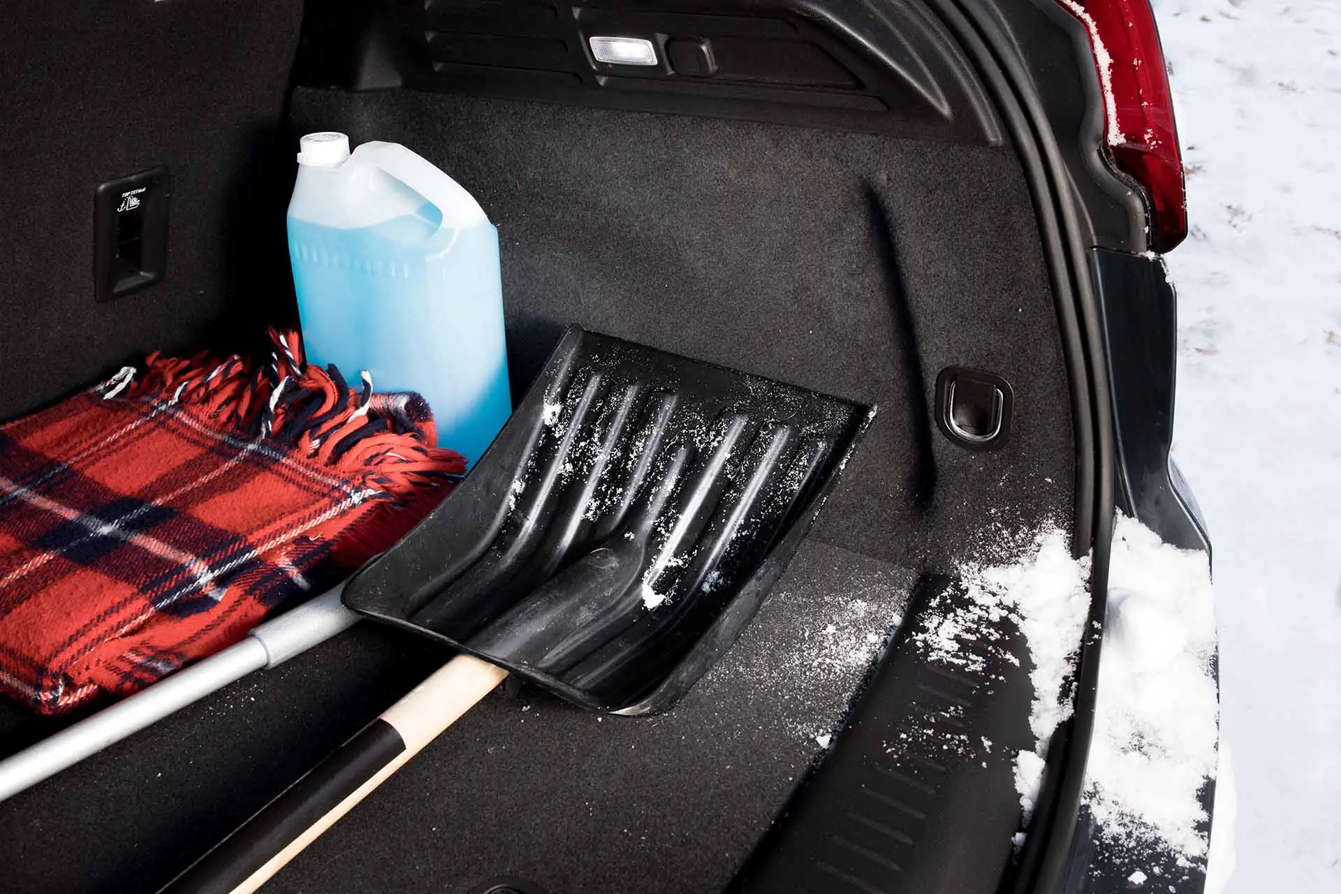 emergency snow shovel in the trunk