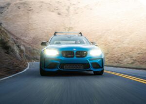 Blue BMW M2 on the road