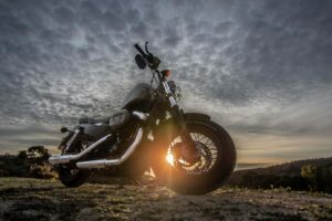 Black Harley Davidson Forty-Eight 1200 motorcycle parked on a dirt road