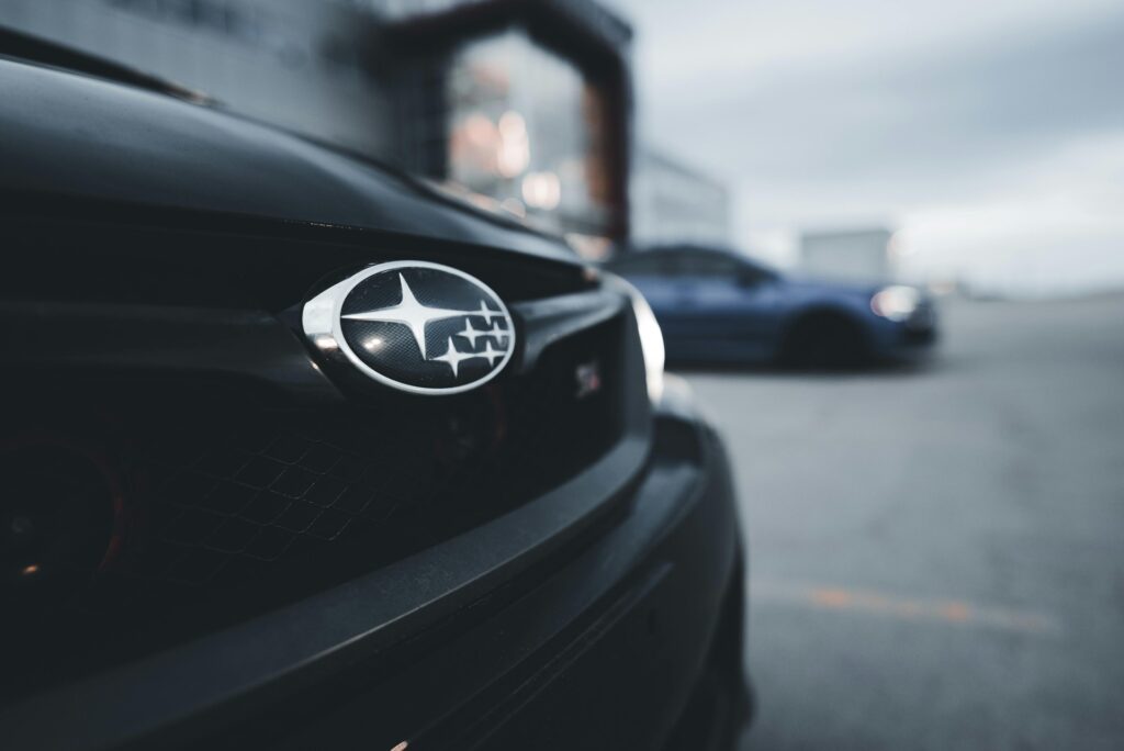 Subaru emblem on a black car