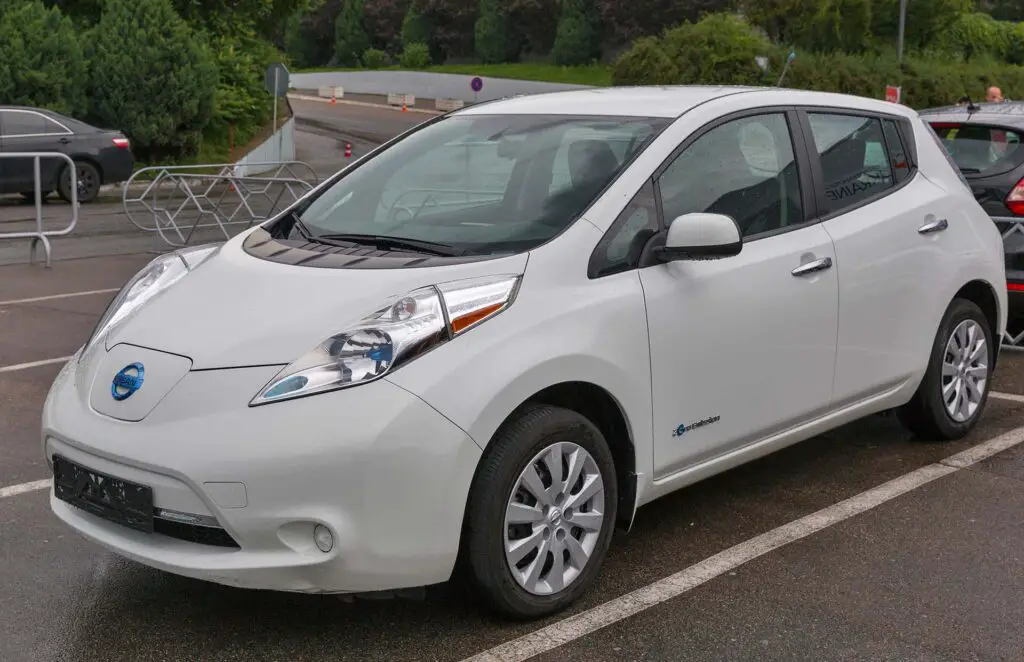 KIEV, UKRAINE - JUNE 10, 2016: Nissan Leaf electric hybrid cars parked outdoor on display at 1st International Trade Show of Electric Vehicles Plug-In in KyivExpoPlaza Exhibition Center.