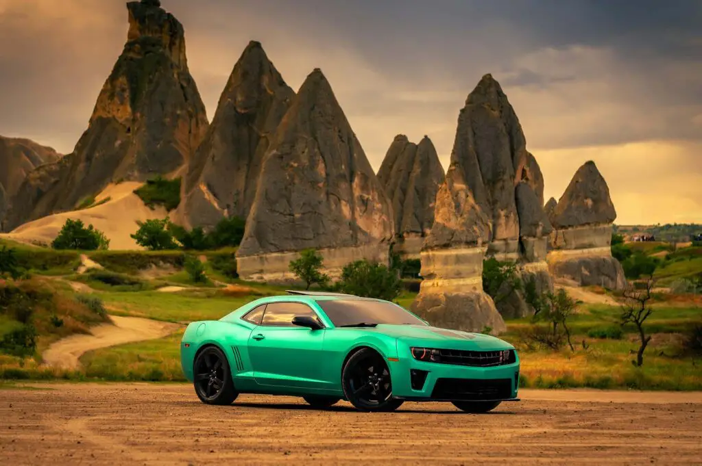 A Modern Chevrolet Camaro on the Background of Rock Formations in Cappadocia, Turkey
