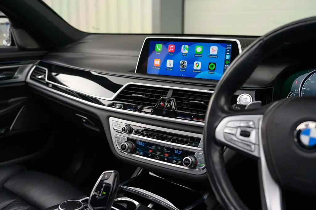 Interior of a luxury BMW with Apple CarPlay
