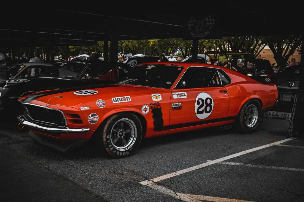 A red vintage Mustang racing car