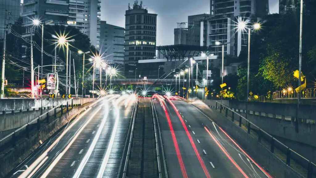 A highway coming out of a city