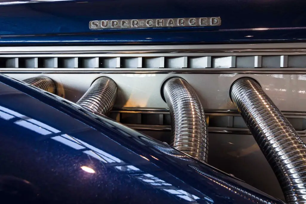  Exhaust system of luxury car Auburn Duesenberg Model SJ Cabrio. Europe's greatest classic car exhibition "RETRO CLASSICS"