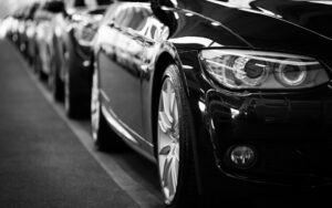 Black cars parked in a line